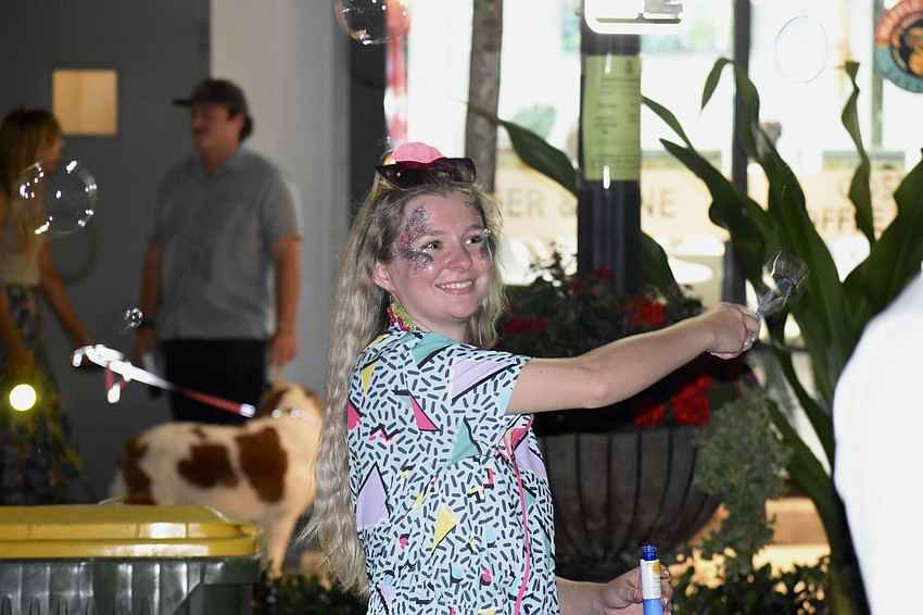 Jessi Powell of Stanley Wealth & Retirement brings some bubbles.