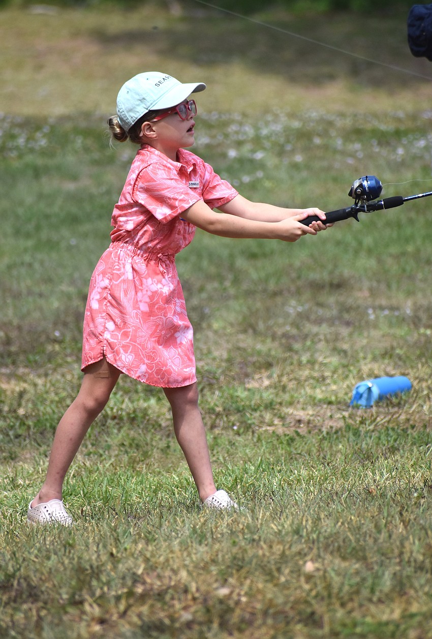 Lakewood Ranch's Nolie Barnett, 7, has fished before but was happy to learn the rules and the proper way to cast.