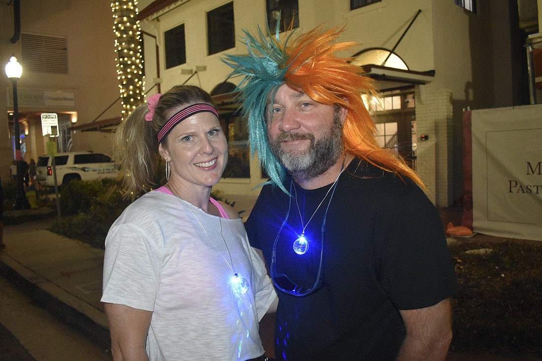 Katie Kephart and Shawn Tritschler get into the 80's spirit.