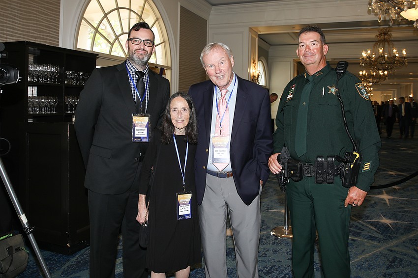 Dustin Tenney, Ann Fruchtman, Koz Kozlowski and Deputy Gabe Eckert.