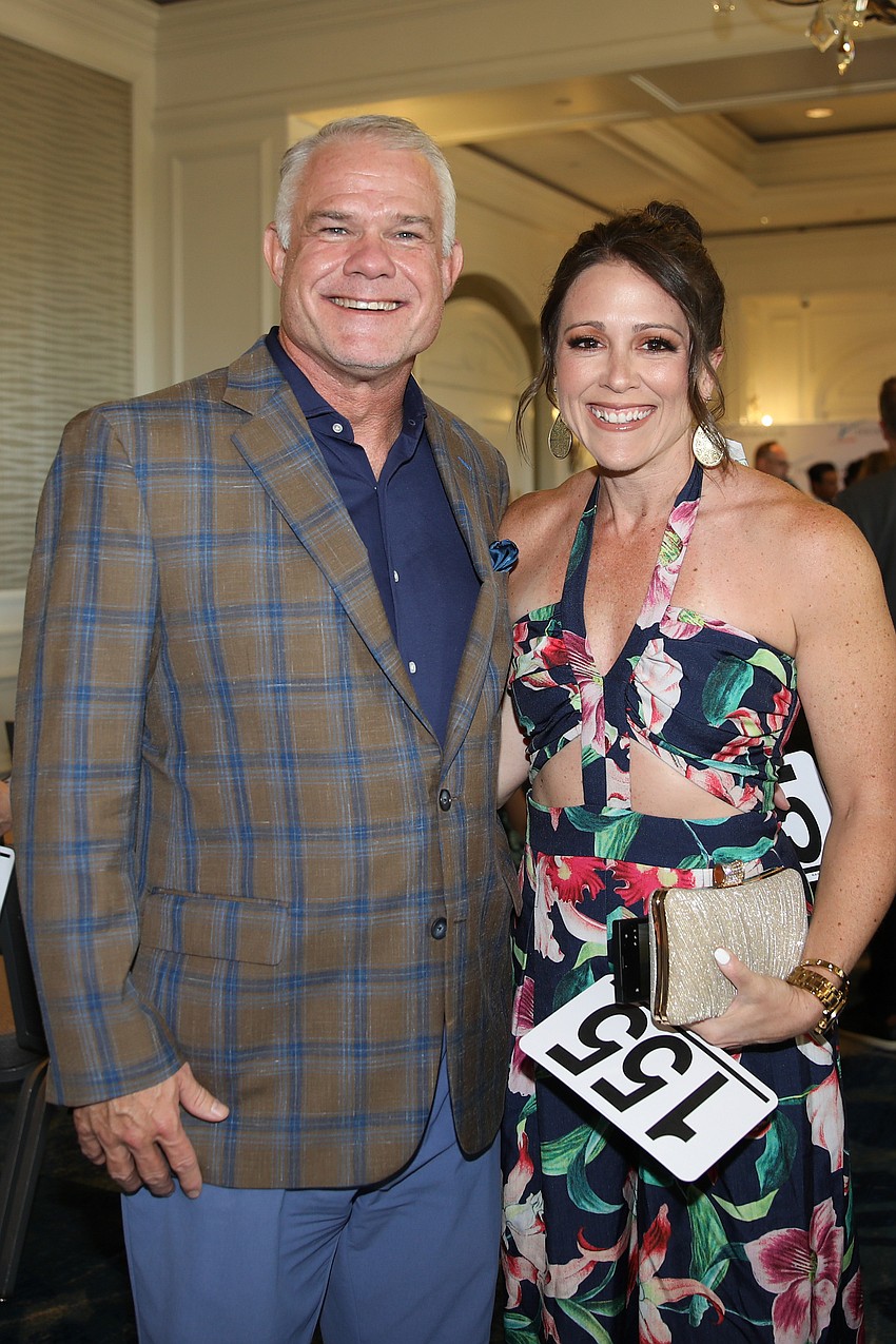 Jason Hughes with Monica Negandhi