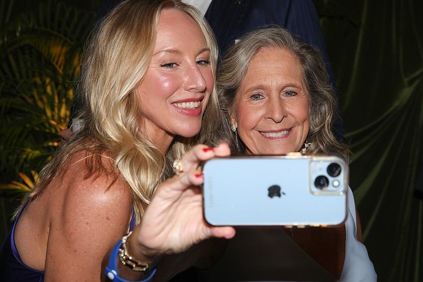 Kerry Rohrssen and Sally Muehlenkamp grab a selfie.