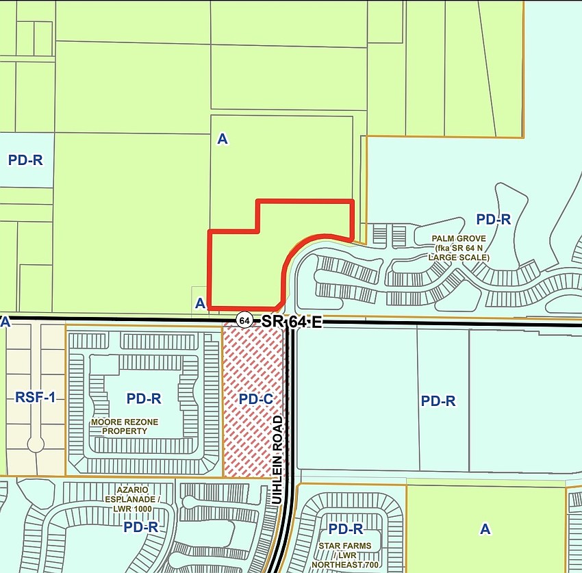 The red outline is the site of the future commercial development.