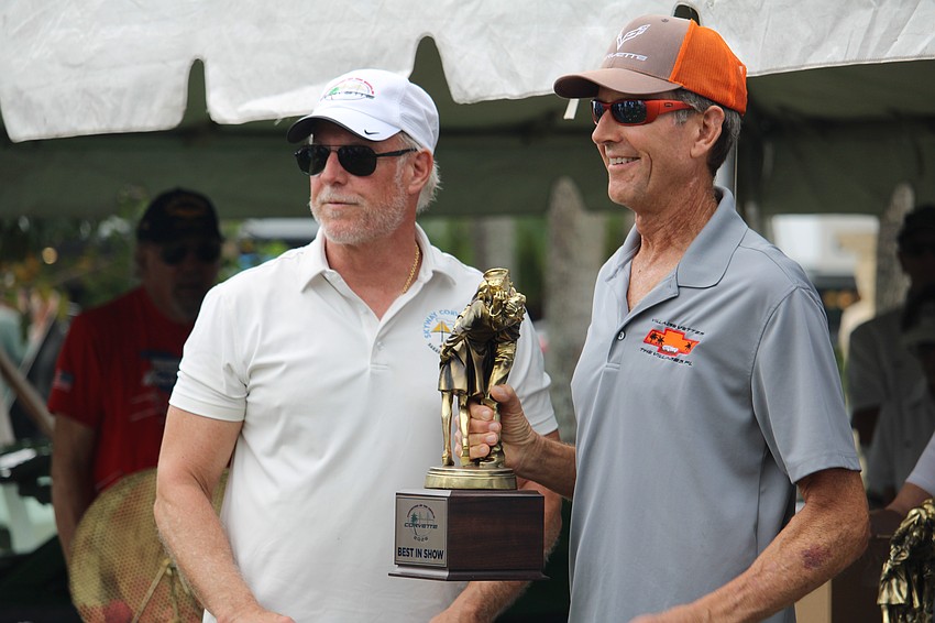 Bob Hanstra collects his Best in Show award from Skyway Corvette Club President Mike Diaferio at Corvettes on the Circle.