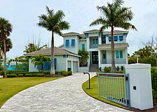 The home at 5910 Gulf of Mexico Drive sold for $4.9 million. Built in 2023, it has four bedrooms, four-and-a-half baths, a pool and 4,272 square feet of living area.