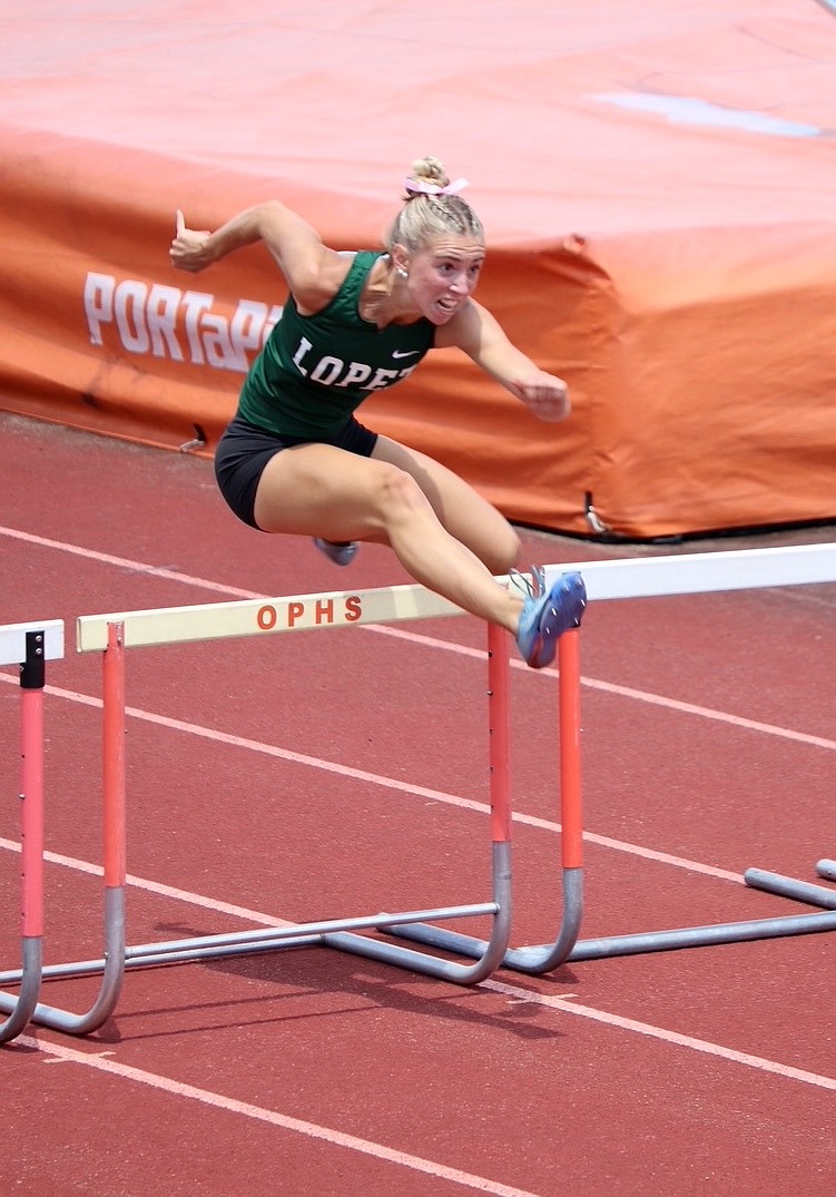 Father Lopez's Lauren Lancing set a school record to win the 100-meter hurdles title at the Region 2-1A meet. Courtesy photo