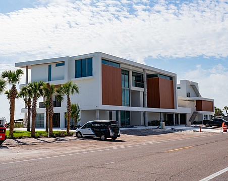 A single-family residence at 3515 Gulf of Mexico Drive has been under construction for years and is nearing completion.