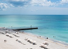 The St. Regis Longboat Key arch is installed on a private groin that extends into the Gulf.