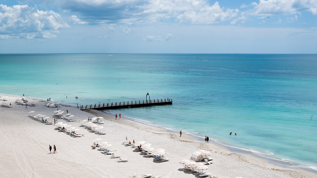 The St. Regis Longboat Key arch is installed on a private groin that extends into the Gulf.