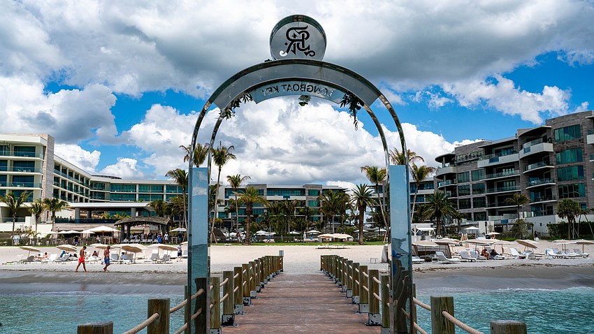 The St. Regis Longboat Key Resort installed a stainless steel arch on a private groin, leading to a lengthy dispute with the town of Longboat Key, with leaders claiming it violate’s the town’s sign code. The St. Regis Longboat Key Resort installed a stainless steel arch on a private groin, leading to a lengthy dispute with the town of Longboat Key, with leaders claiming it violate’s the town’s sign code.