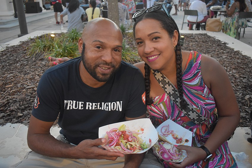 Parrish's Corey Wade and Jessica Brown split two tacos during the Cinco de Mayo celebration.