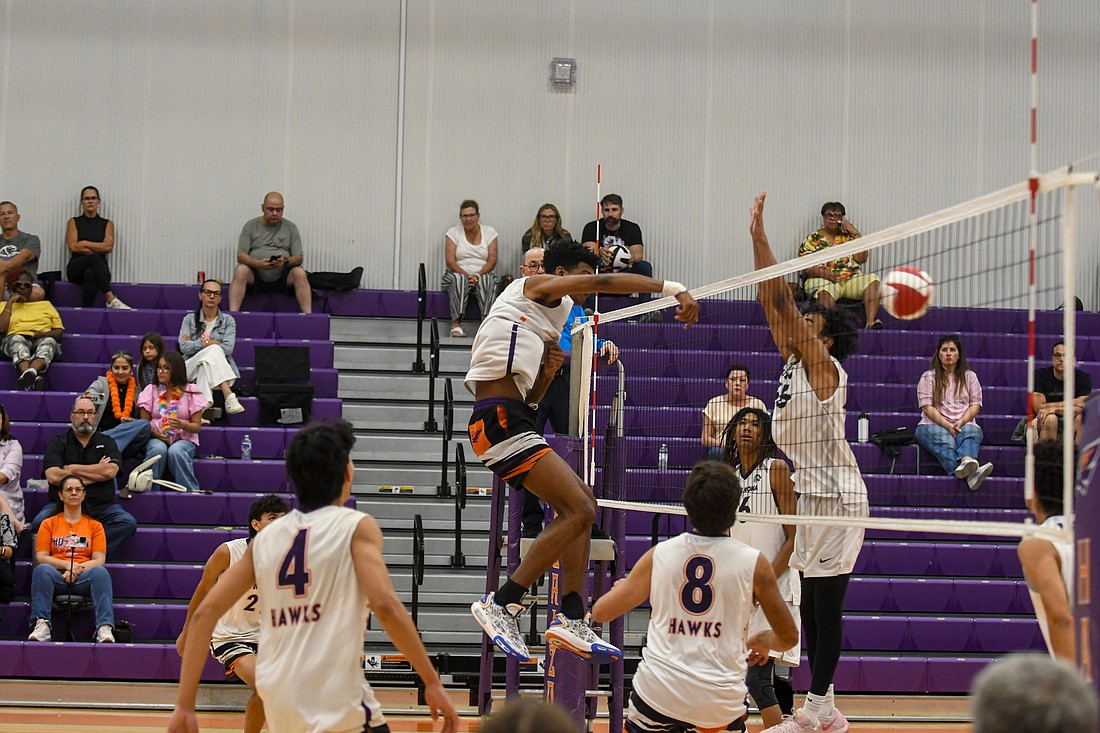 Senior Joshua Robinson easily attacked the ball from the middle over the hands of his teammates.