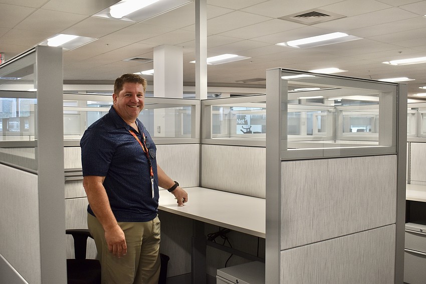 Cary Knight, director of Property Management, says that even with repairs and remodeling, 9000 Town Center Parkway cost far less than designing and constructing a new administration building.