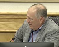 County Commissioner Tom Knight on Tuesday raised the issue of a fee charged by the Tax Collector's office on money raised by the school district's optional 1-mill property tax.