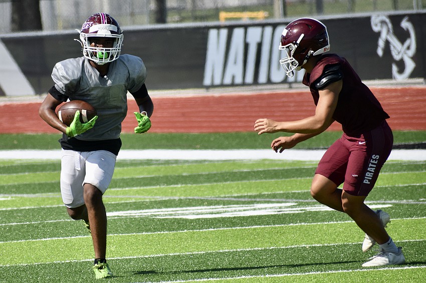 Chased here by junior Ben Pham (right), sophomore wide receiver Marquis Koonce (left) has transferred from Palmetto for his junior season. In 2025, Trevion Dixon and Anquan Polynice led the way with 505 and 402 receiving yards, respectively.