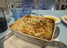 Pastitsio ($25) made with Greek macaroni with ground beef, fresh herbs topped with a creamy béchamel sauce.