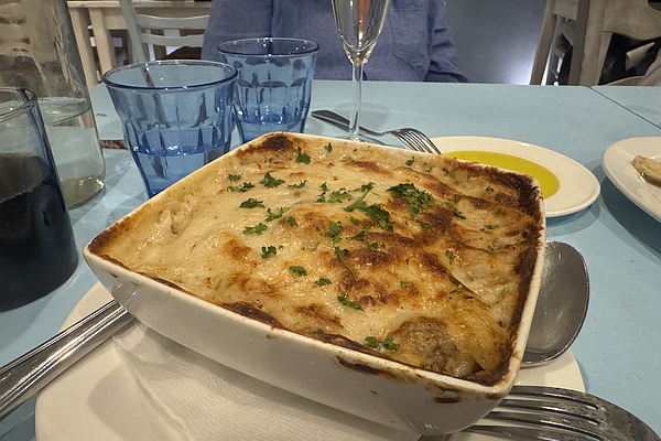 Pastitsio ($25) made with Greek macaroni with ground beef, fresh herbs topped with a creamy béchamel sauce.