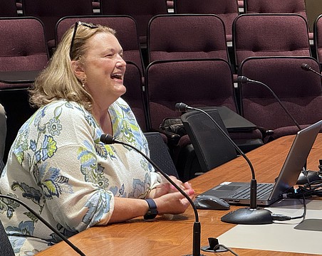 Karie Friling makes brief comments to the Sarasota City Commission during her visit to the May 4 commission meeting.