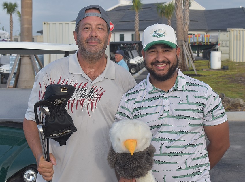 Lakewood Ranch's Gennaro Daniello and Palmetto's Evin Martinez prepare to tee off in the Lakewood Ranch Community Foundation Golf Tournament.