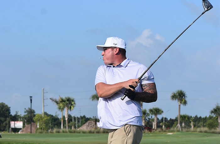 Bradenton's Trey Johnson finishes his swing during the Lakewood Ranch Community Foundation Golf Tournament, which raises funds for local nonprofits.