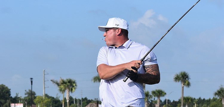 Bradenton's Trey Johnson finishes his swing during the Lakewood Ranch Community Foundation Golf Tournament, which raises funds for local nonprofits.