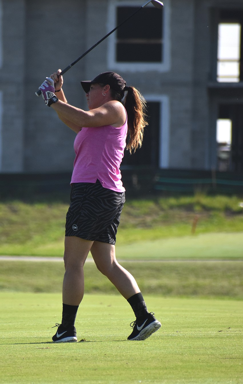 Cortez's Katelyn Grant takes a shot May 8 at Calusa Country Club during the Lakewood Ranch Community Foundation Golf Tournament.