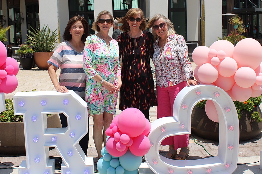 Port Charlotte's Janine Hewitt, Weeki Wachee's Cynthia Zappone, and Punta Gorda's Melinda Means and Sue Coldiron meet for a day of fun at Petals and Poses at Waterside Place.