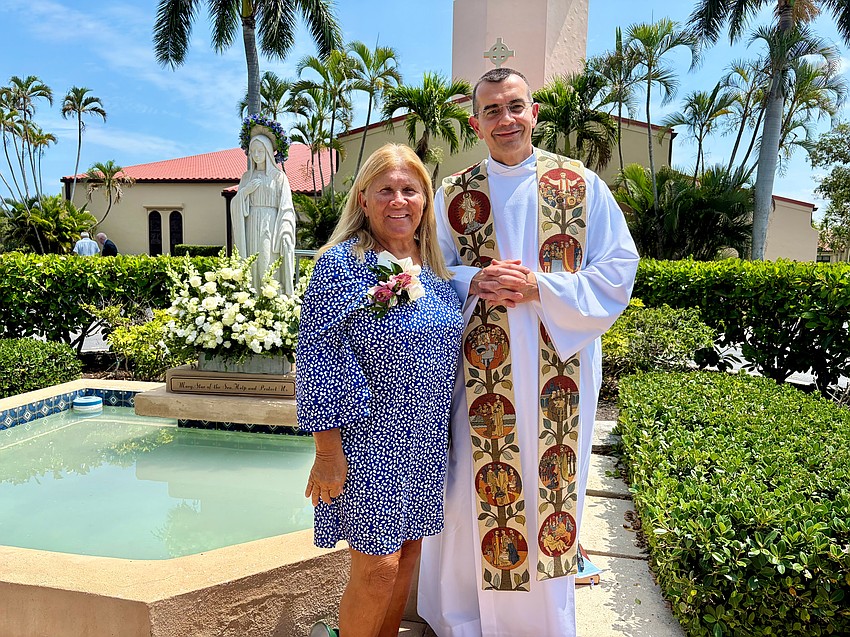 Bonnie Schneider and Father Robert Dziedziak