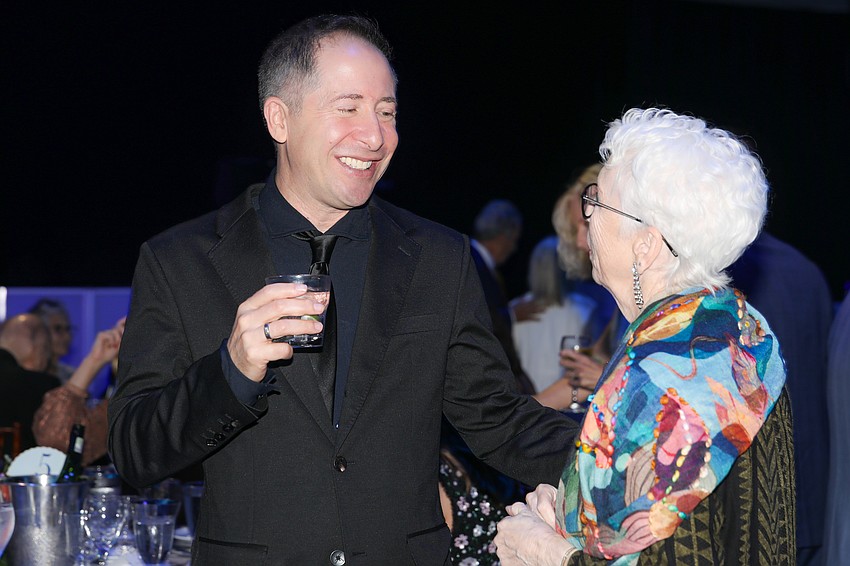 Daniel Jordan chats with a ballet patron.