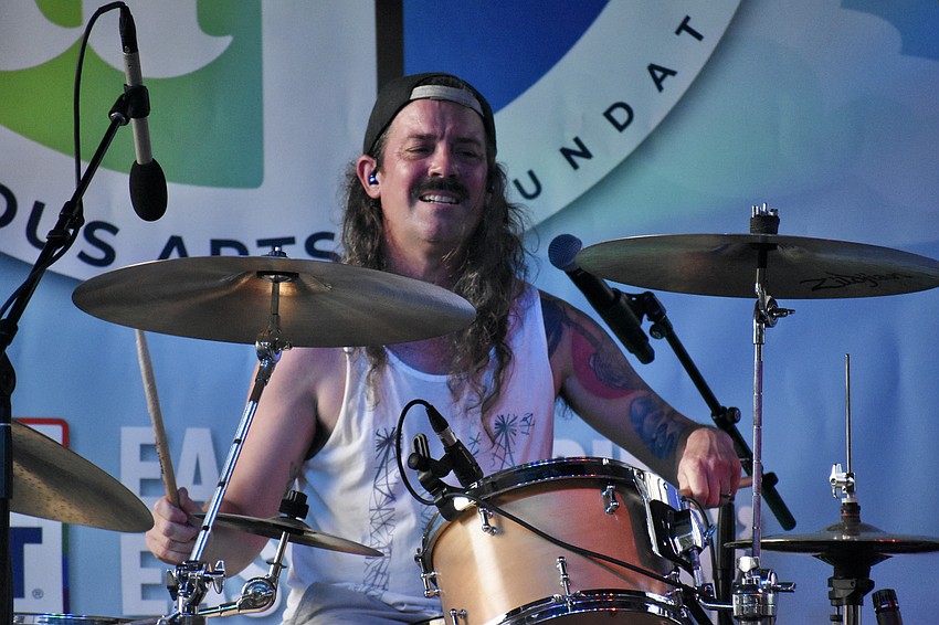 David Curran of MeteorEYES performs on stage.