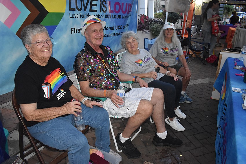 Joan Faucher, Richard Dilts, Valerie Fields and Sandi Armstrong of First Congregational United Church of Christ staff an event table.