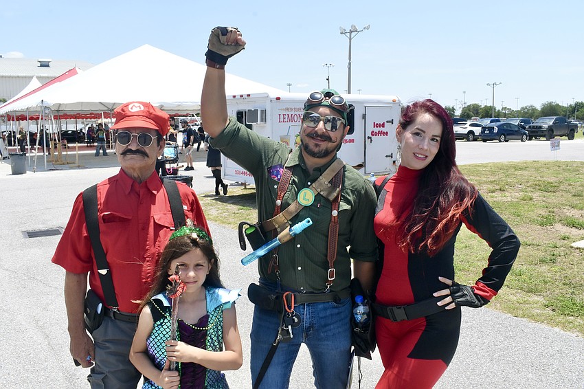 Leonora Rosales (right) and her father-in-law Armando Rosales, daughter Michaella Rosales, 7 and husband Chayanne Rosales enjoy the event in costume.