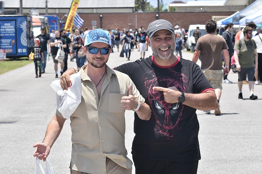 Travis Belanger and Jim Pollet return from a successful shopping mission for comics.