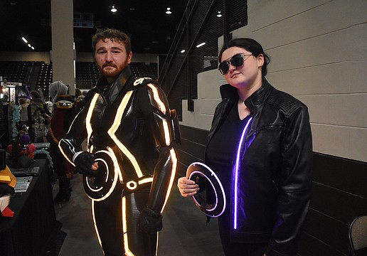 Joseph Sprouse created costumes based on "Tron" that he and his sister Isabel Sprouse wore to the event.