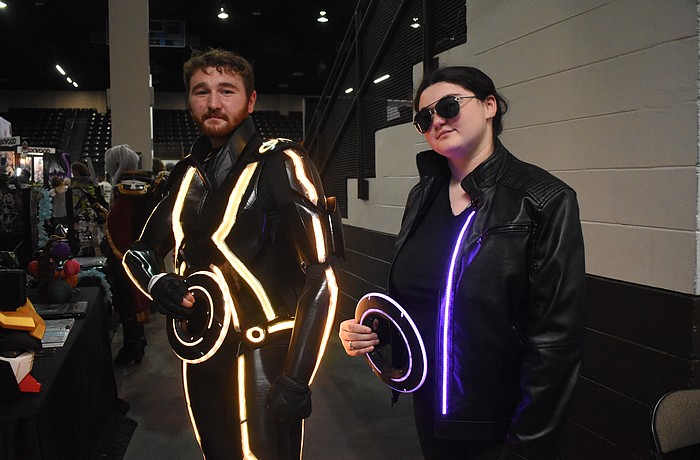 Joseph Sprouse created costumes based on "Tron" that he and his sister Isabel Sprouse wore to the event.