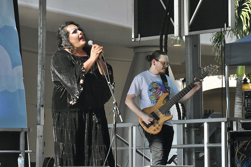 Alex Oppy and Jacob Steele of Sorry Barb perform on stage.