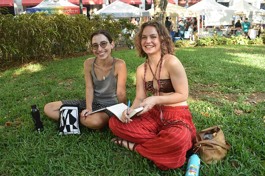 Jamie Saunders and friend Liz Bates enjoy the park green.