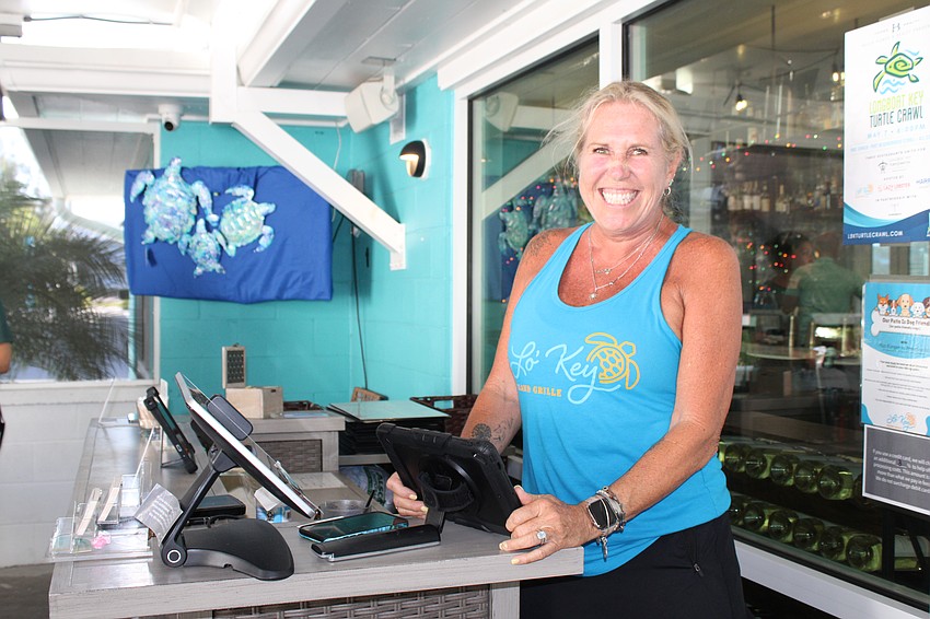Jessie Leigh Bolinsky greets patrons with the new Turtle Crawl event on Longboat Key.