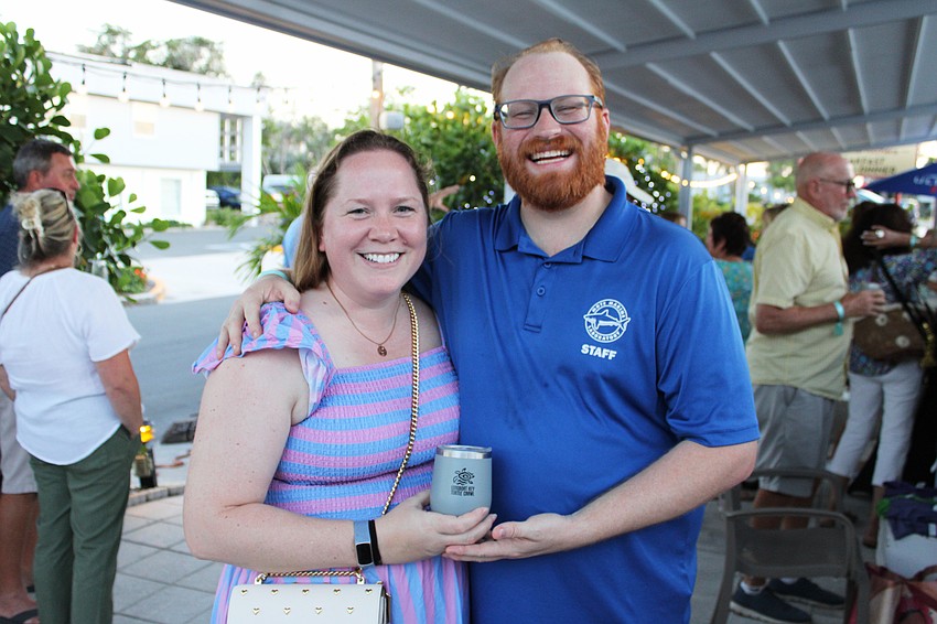 Erin and Dr. Jake Lasala of Mote Marine's Sea Turtle Conservation & Research department connect with Longboaters at the first-ever Turtle Crawl fundraiser.