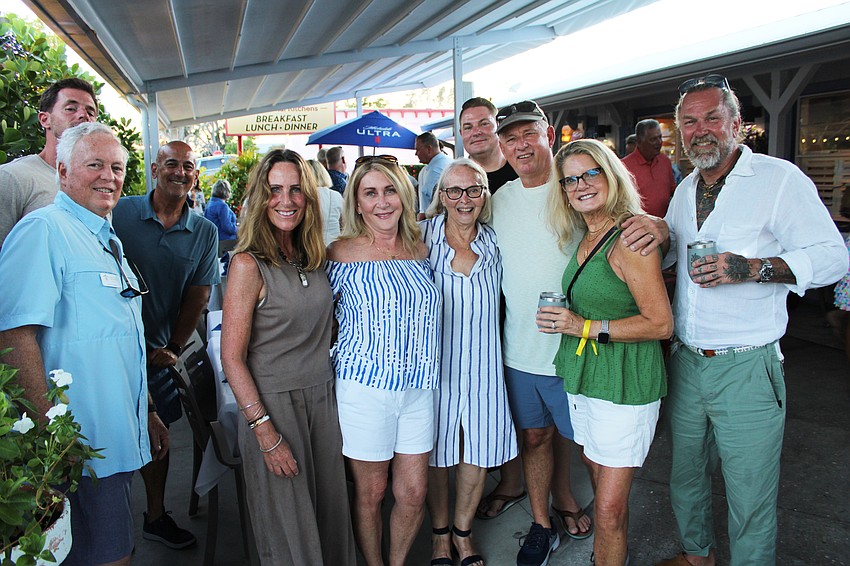 Friends from the Buttonwood neighborhood of Longboat Key close out the debut Turtle Crawl.