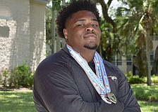 Kaleb Exume has taken his talents from Parrish Community to Cardinal Mooney football for his senior season this fall. But beyond the gridiron, he's dominated in the weight room.