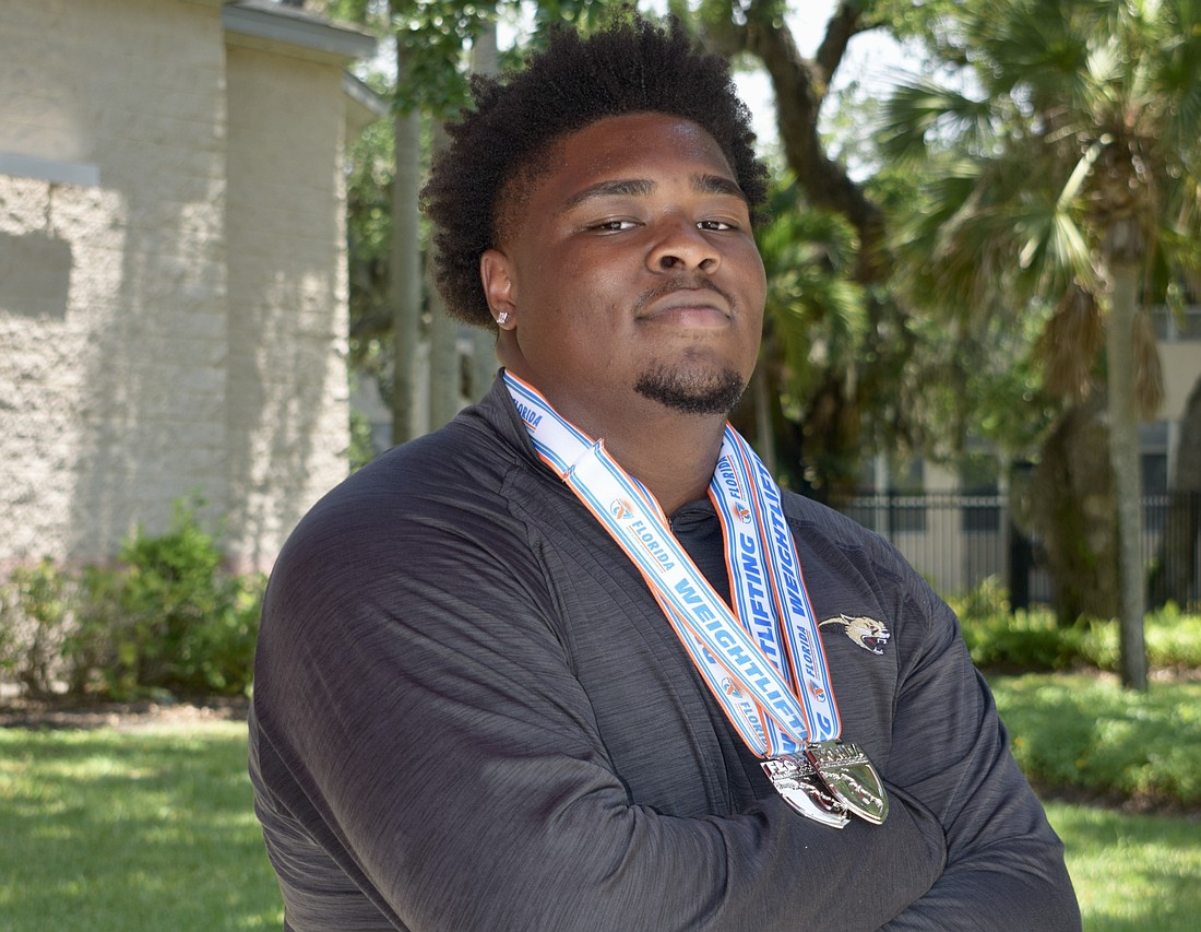 Kaleb Exume has taken his talents from Parrish Community to Cardinal Mooney football for his senior season this fall. But beyond the gridiron, he's dominated in the weight room.