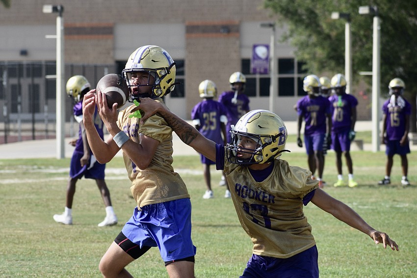 Freshman linebacker Cainan Kennedy (left) and sophomore linebacker Dylan Sanchez (right) go toe-to-toe in a pass breakup drill. Last season, they contributed to a stifling defense which allowed just 10.9 points per game. Freshman linebacker Cainan Kennedy (left) and sophomore linebacker Dylan Sanchez (right) go toe-to-toe in a pass breakup drill. Last season, they contributed to a stifling defense which allowed just 10.9 points per game.