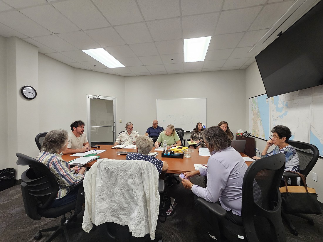 Public Lands and Natural Resource manager Erick Revuelta (far left) gives a report to the Flagler County Land Acquisition Committee. Photo by Sierra Williams