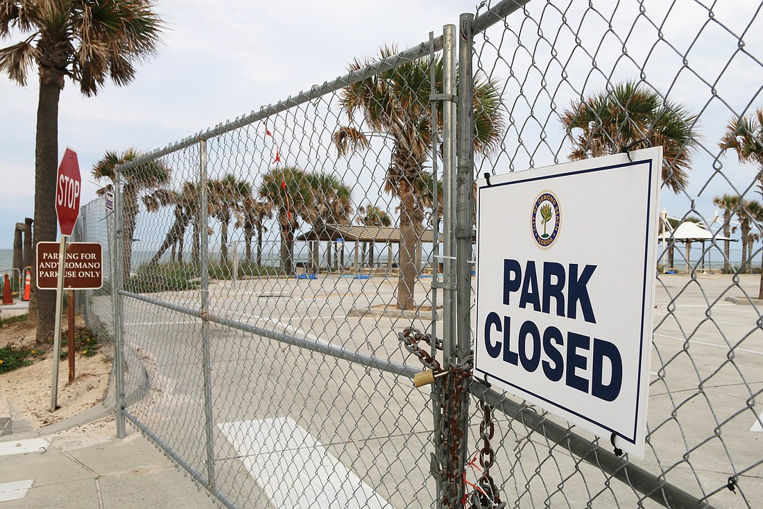 A staging area has been fenced off at Andy Romano Beachfront Park, blocking off about a third of the parking lot space. Photo by Jarleene Almenas