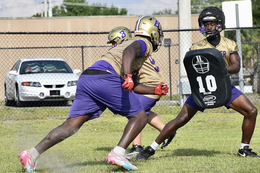 Junior defensive tackle Maleek Lee (left) rushes junior linebacker Kymani Sellers (right) during a drill. Both of them figure to be crucial cogs in the Tornadoes' defense this fall. Junior defensive tackle Maleek Lee (left) rushes junior linebacker Kymani Sellers (right) during a drill. Both of them figure to be crucial cogs in the Tornadoes' defense this fall.