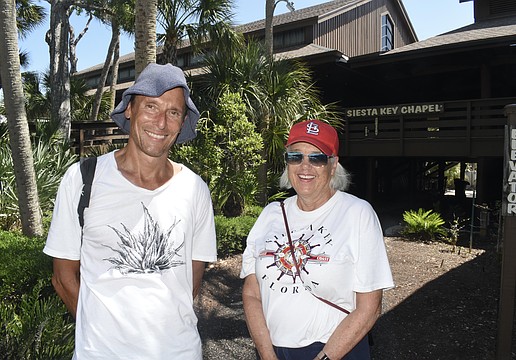 Dan Moriarty, community liaison and board member of the Tree Foundation, and Community Relations Co-Chair Janie Pratt stand on the campus.