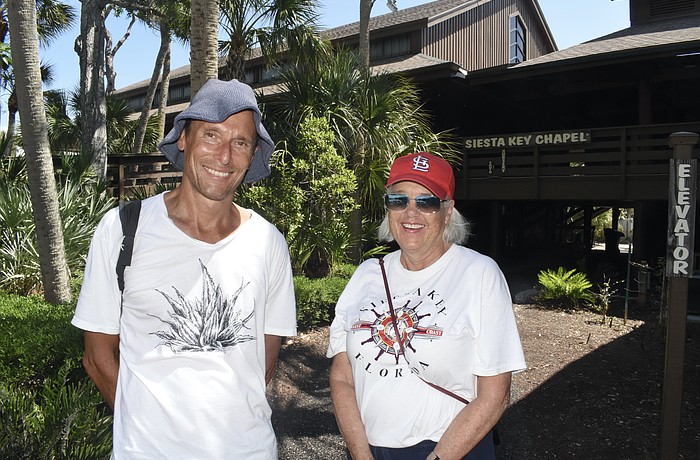 Dan Moriarty, community liaison and board member of the Tree Foundation, and Community Relations Co-Chair Janie Pratt stand on the campus.