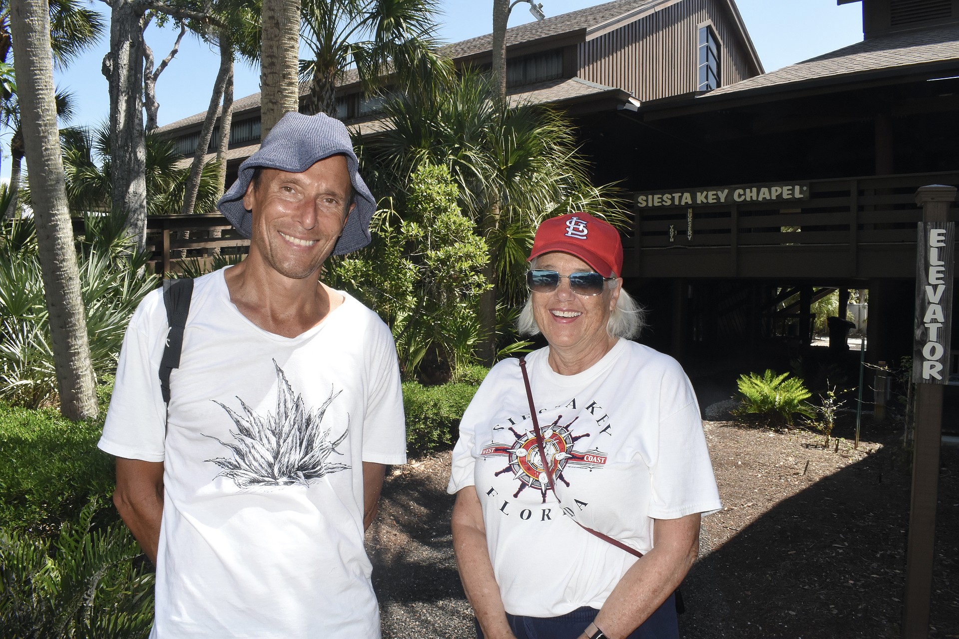 Dan Moriarty, community liaison and board member of the Tree Foundation, and Community Relations Co-Chair Janie Pratt stand on the campus.