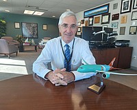 Retired Sarasota-Bradenton International Airport President and CEO Rick Piccolo's name is now emblazoned on the airport loop road at SRQ.
